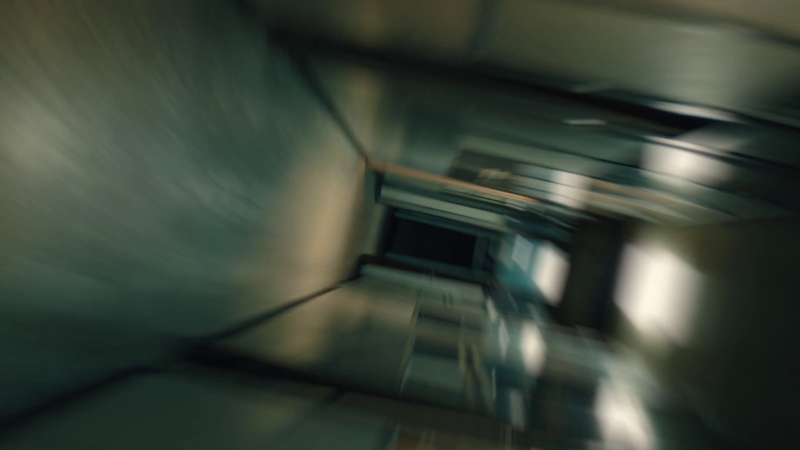 a blurry photo of a hallway in a building