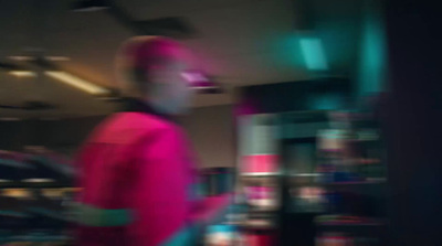 a blurry photo of a person in a room