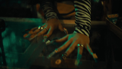 a person with their hands on a table