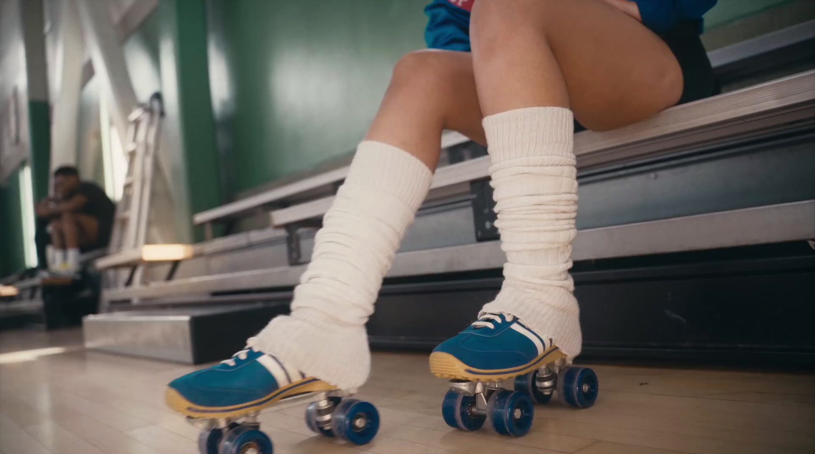 a person riding a skateboard down a hallway