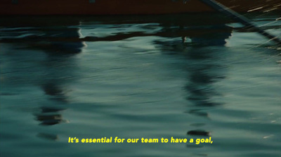 a boat in a body of water with the words it's essential for team