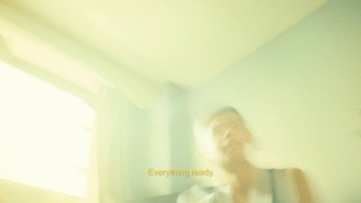 a blurry photo of a person standing in a room