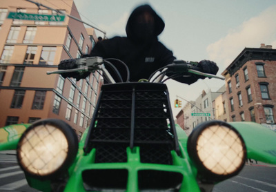 a person riding a motorcycle on a city street