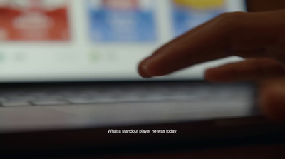 a close up of a person typing on a laptop