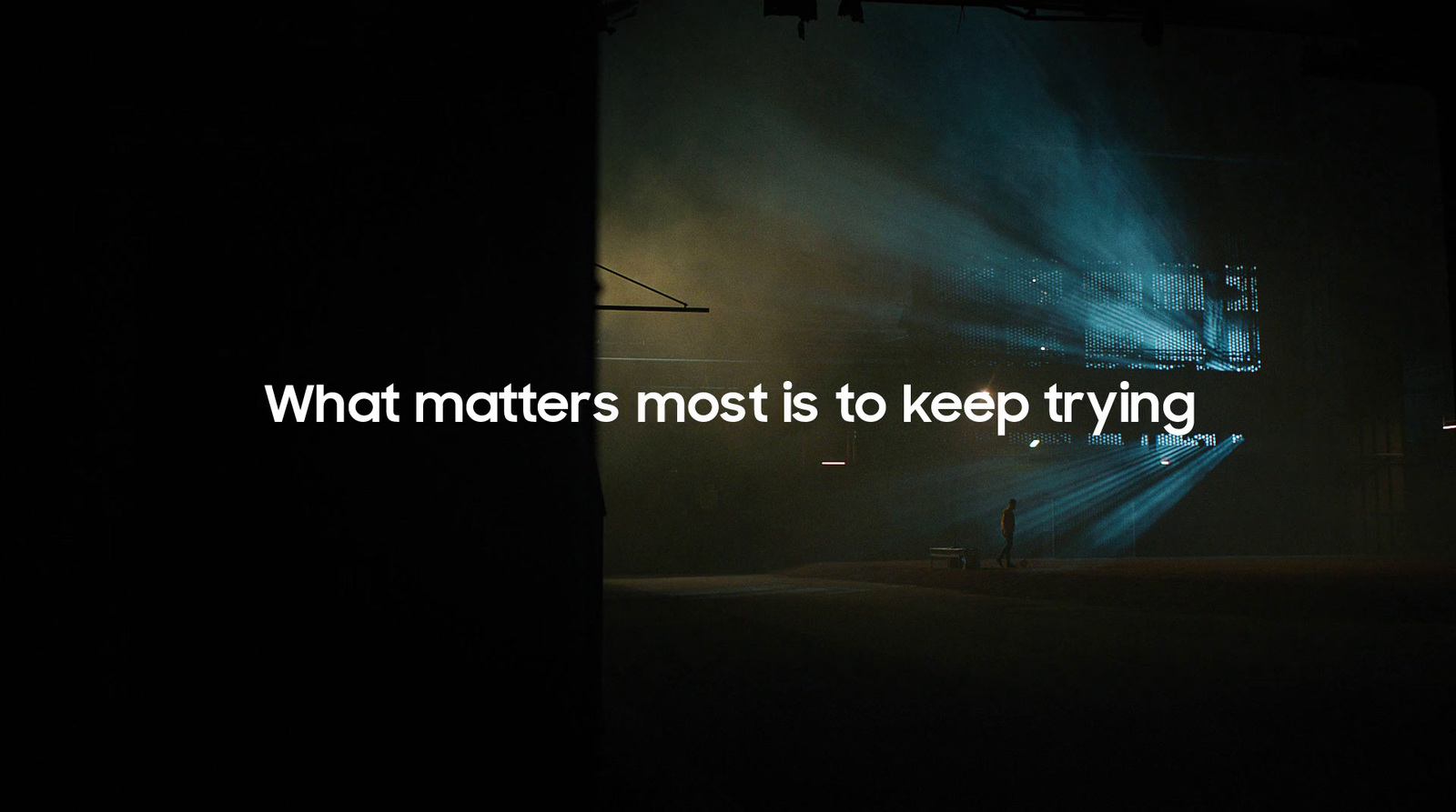 a photo of a stage with the words what matters most to keep trying