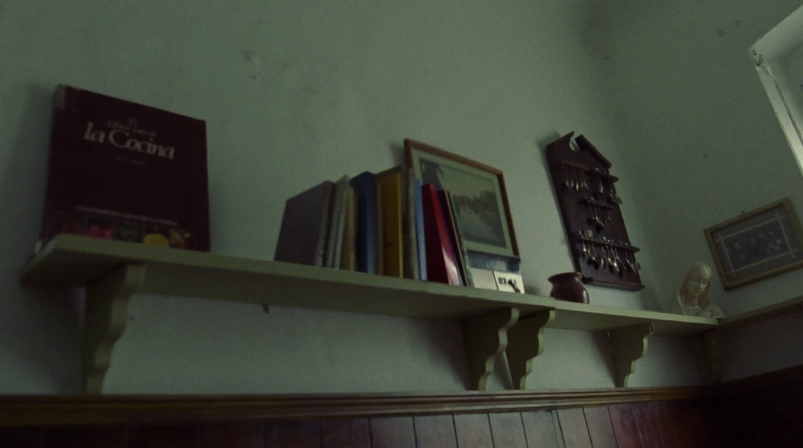 a bookshelf with a few books on top of it