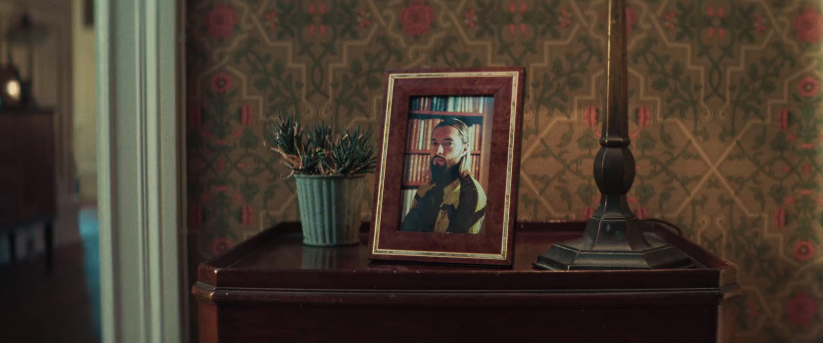 a picture of a man in a picture frame on a table