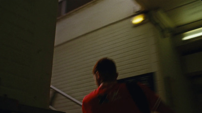 a man walking down a flight of stairs