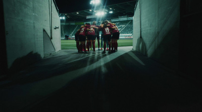 a group of people standing in a tunnel