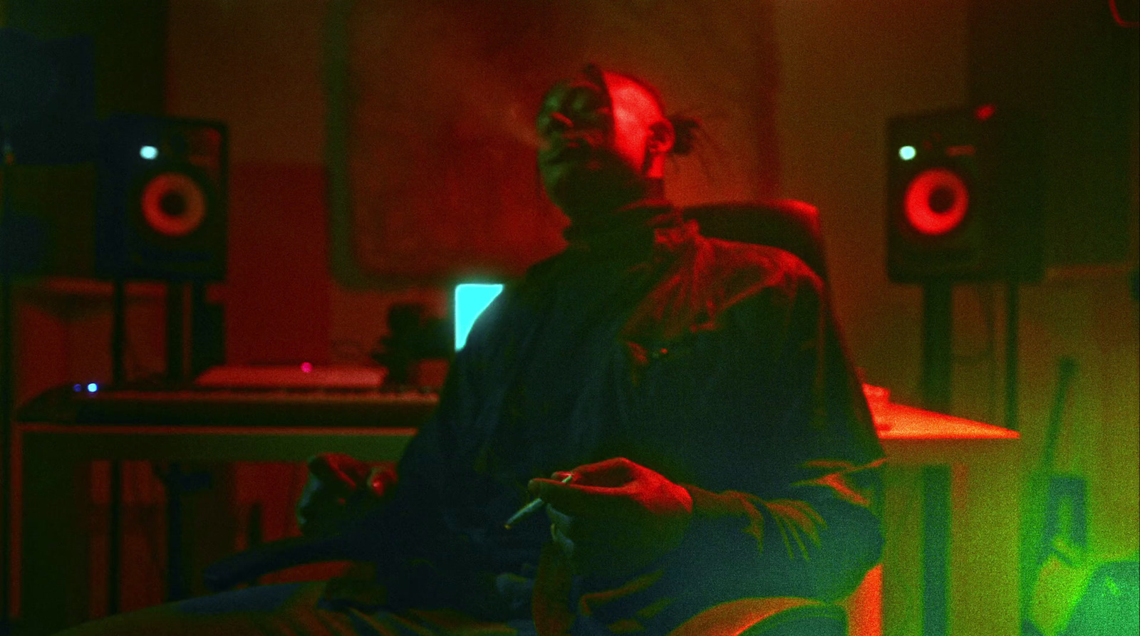 a man sitting in a chair in a room