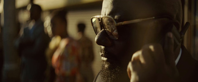 a man with a beard and sunglasses on