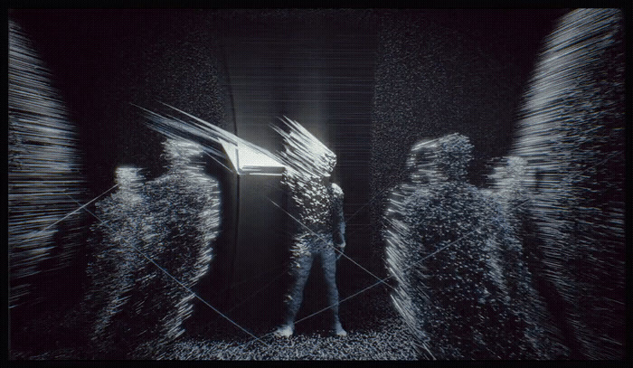 a black and white photo of a person standing in a dark room