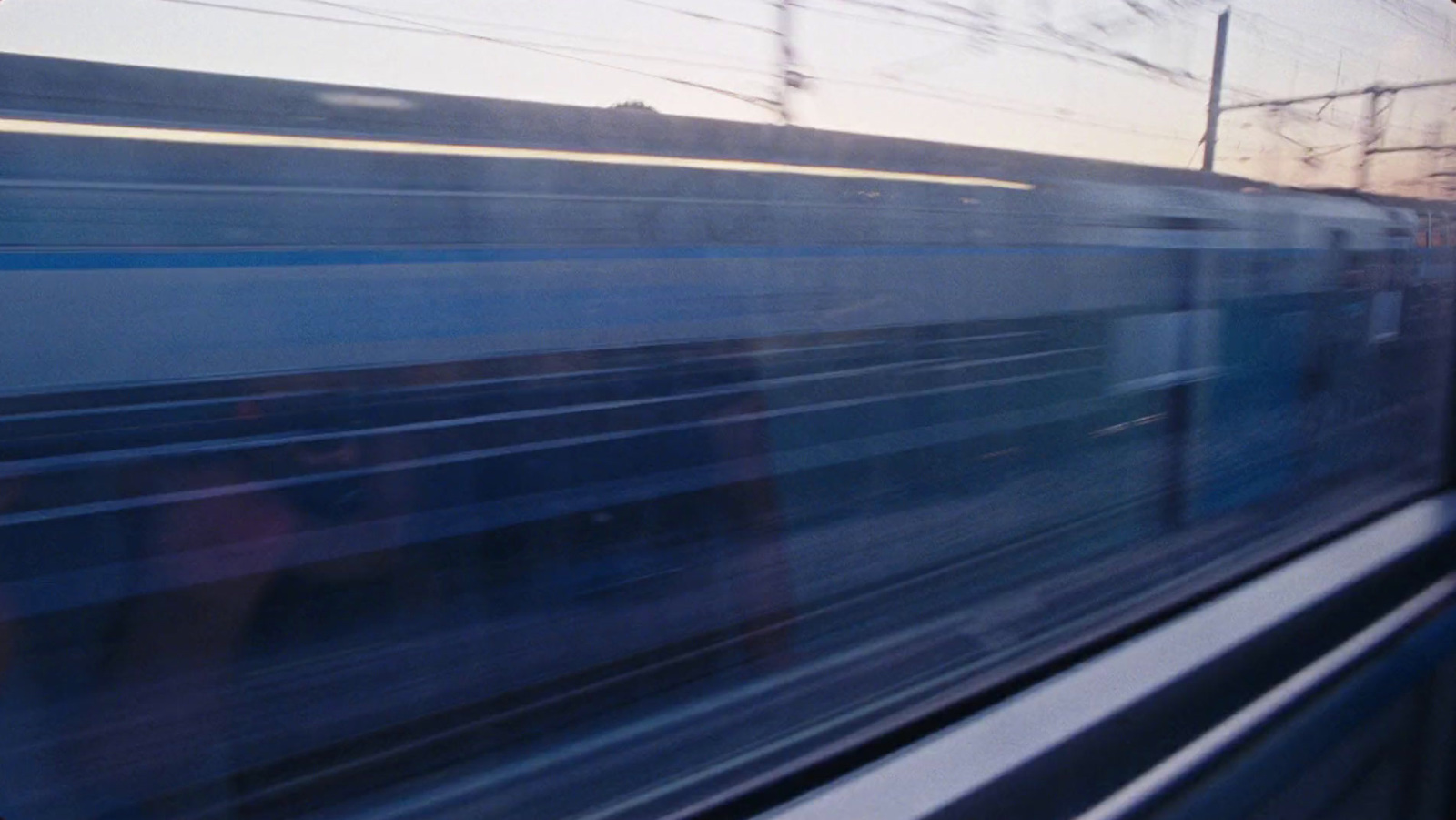 a blurry photo of a train passing by