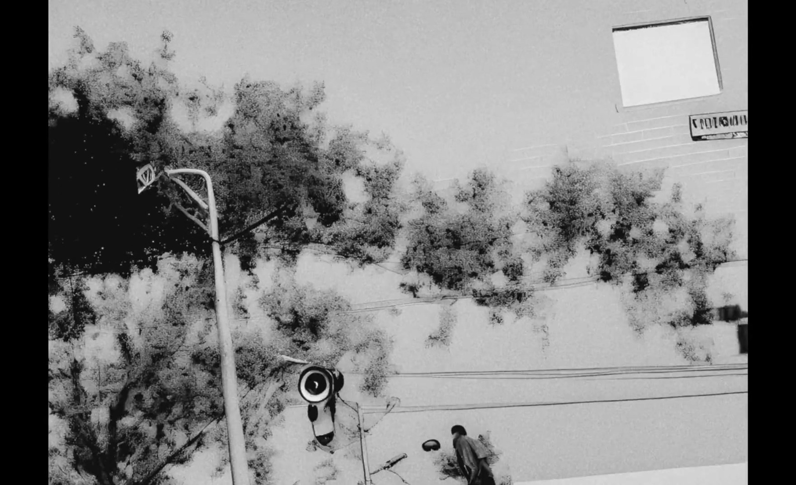 a black and white photo of a basketball hoop