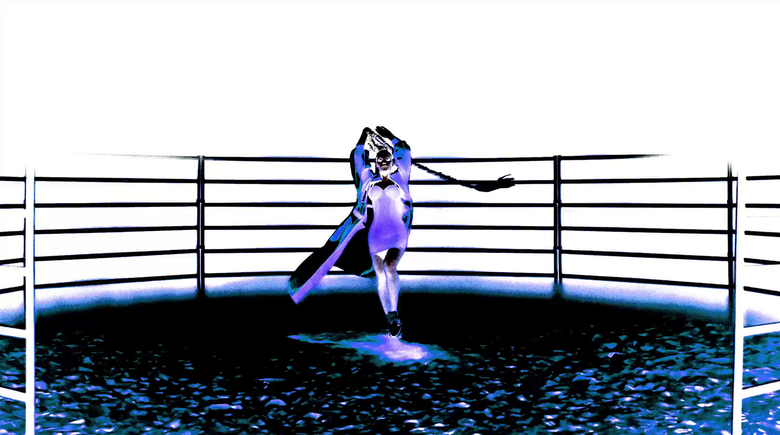 a woman is standing on a boat in the water