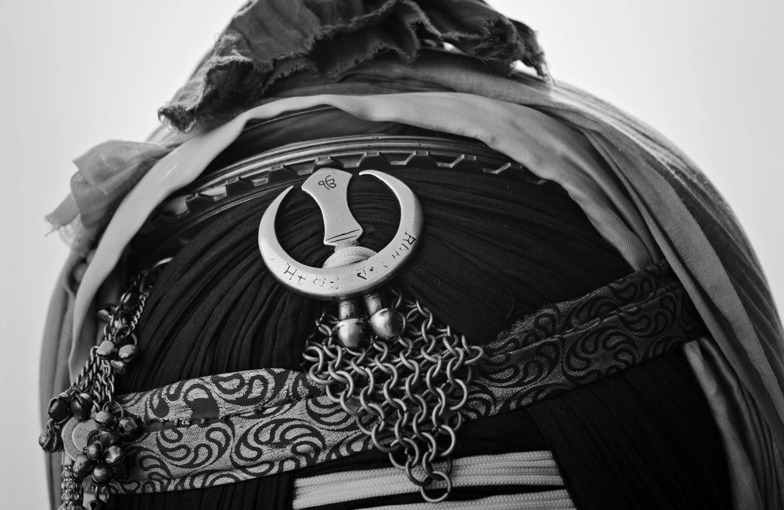 a close up of a woman's head with a ring on it