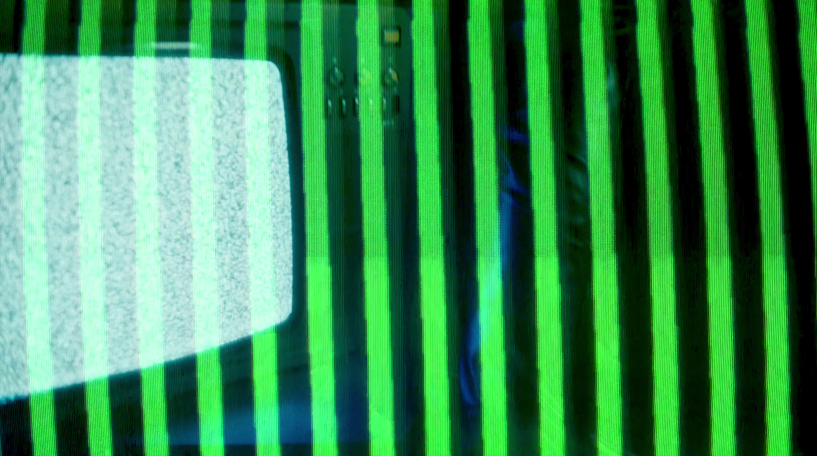 a television screen with a green and black striped pattern