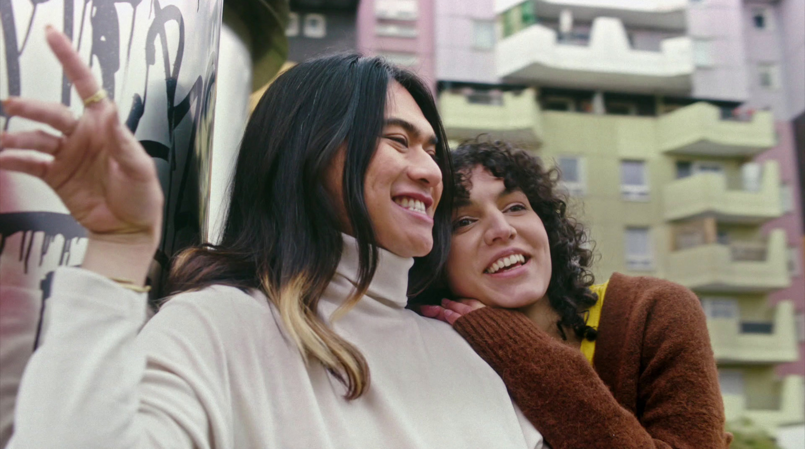 a couple of women standing next to each other