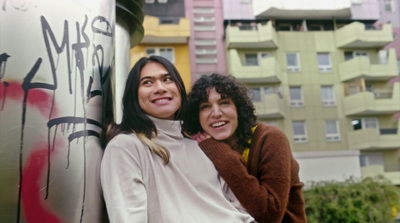 a couple of women standing next to each other