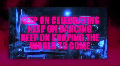 a sign that says keep on celebrating keep on dancing keep on shaping the world to