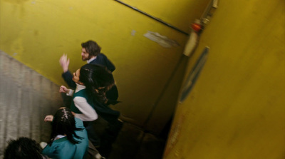 a group of people walking up a flight of stairs