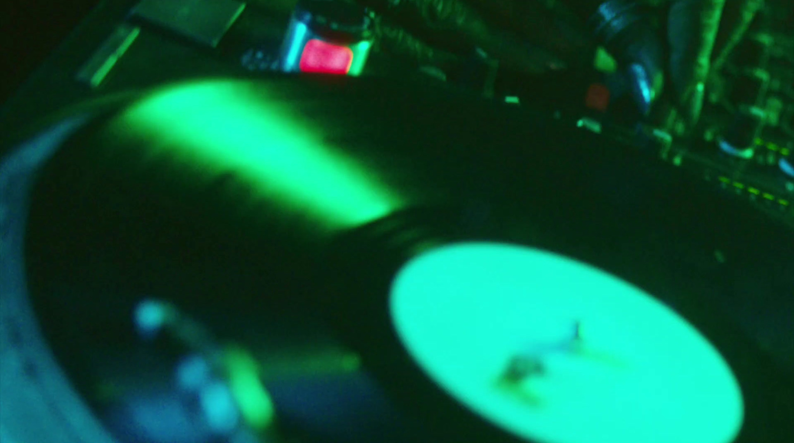 a record player is playing music on a turntable