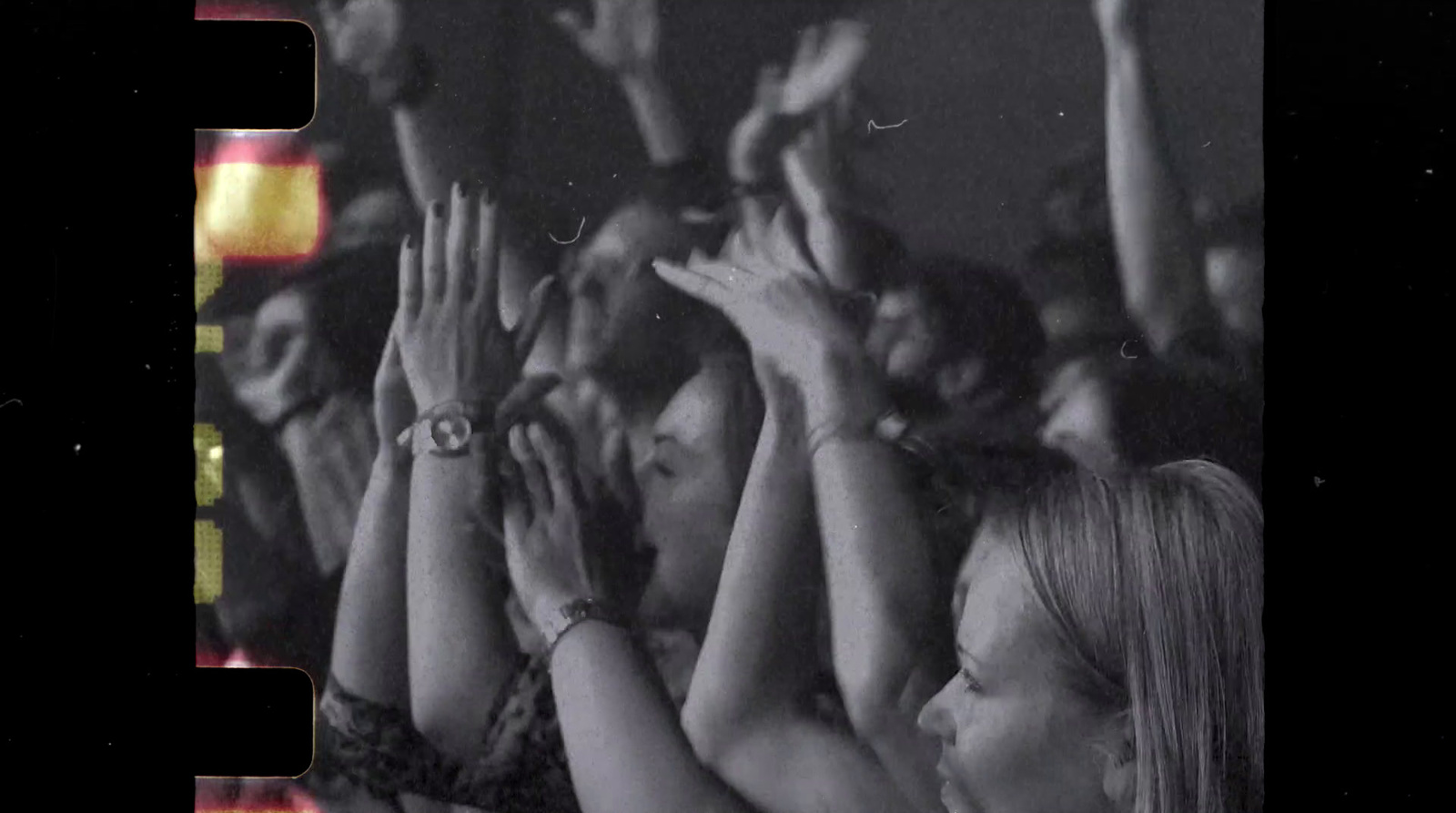 a black and white photo of a crowd of people