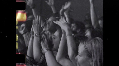 a black and white photo of a crowd of people